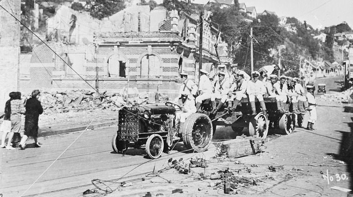 Earthquake damage to post office Napier 1931 with HMS Veronica navy personnel helping