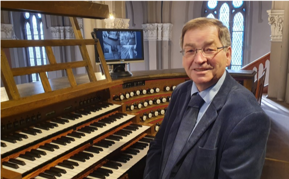 Hans Hieschler at the organ